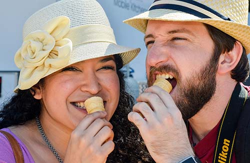Couple tasting garlic ice cream at the Gilroy Garlic Festival