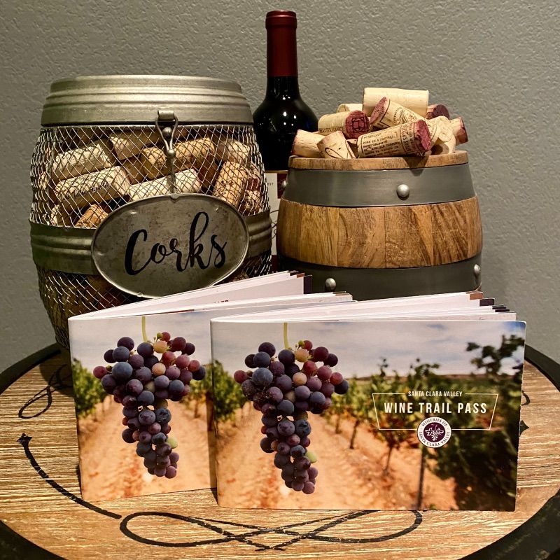 Santa Clara Valley Wine Trail Passes with Corks in two barrels and a wine bottle