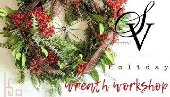 Wreath with berries, red and green ribbon and pine leaves