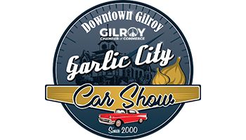 Garlic City Car Show logo with golden garlic bulbs and a red car