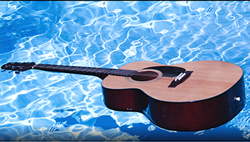 Guitar floating ontop of water