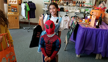 Children in Dorothy and Spider-Man costumes